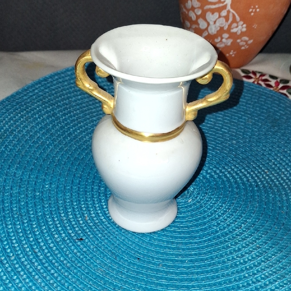 Elegant White Vase with Gold Accents